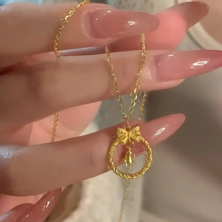 Krisha Gold Bow Bell Necklace