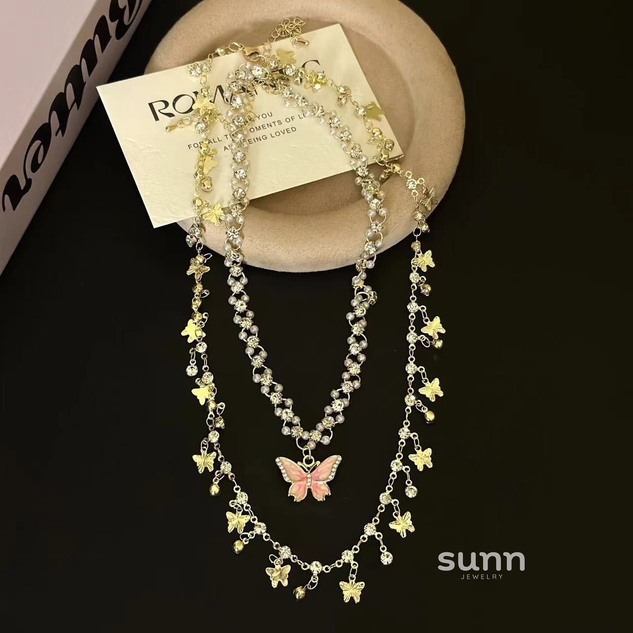 Kyndell Pink Butterfly Layered Necklace [SRO1KM3V]