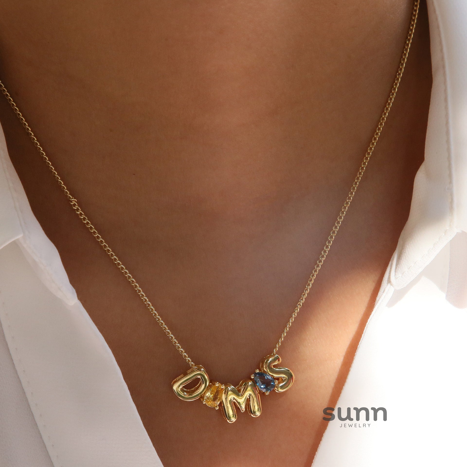 Kynsley Gold Charm Necklace [UM0USD3B]