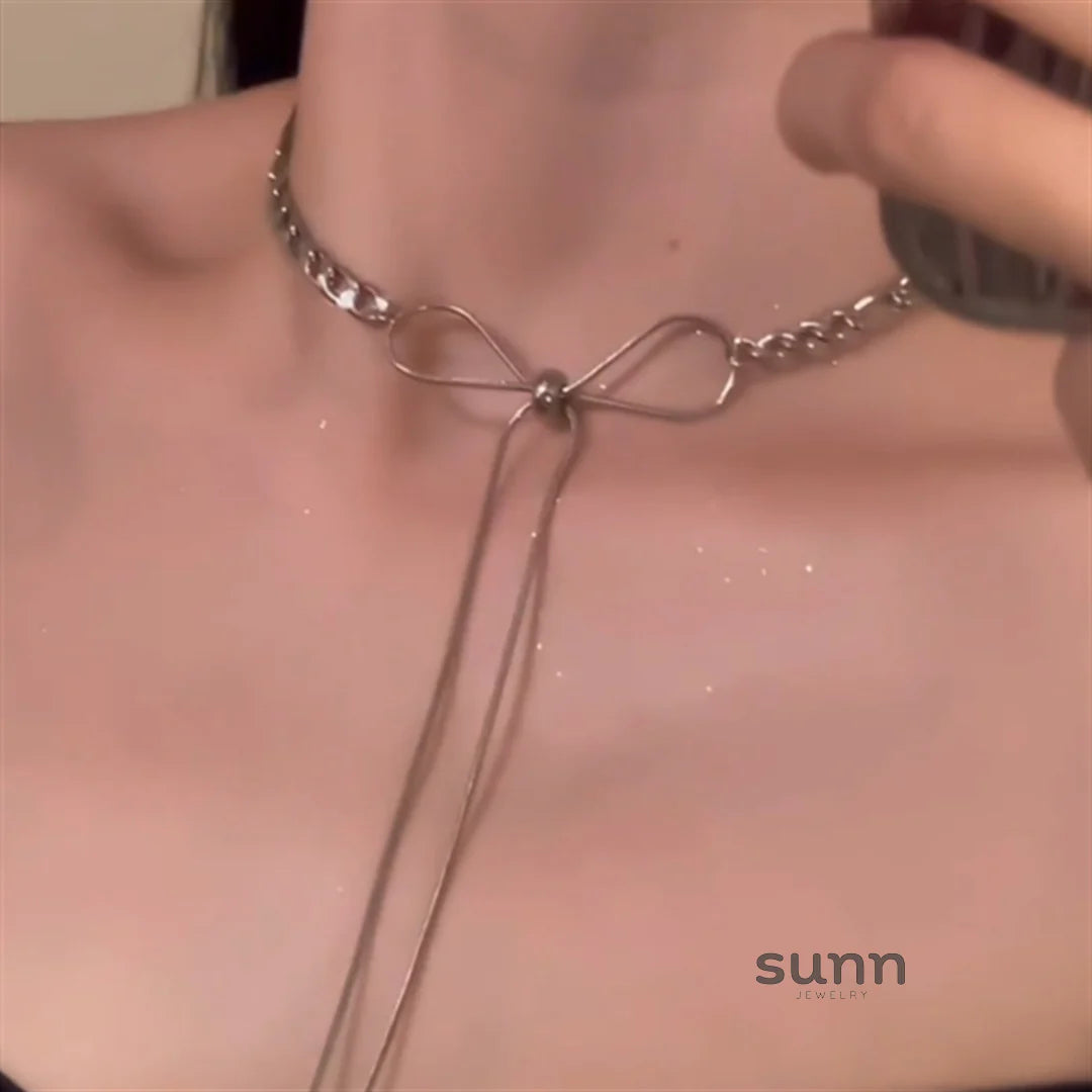 Leigha Silver Bow Tassel Necklace