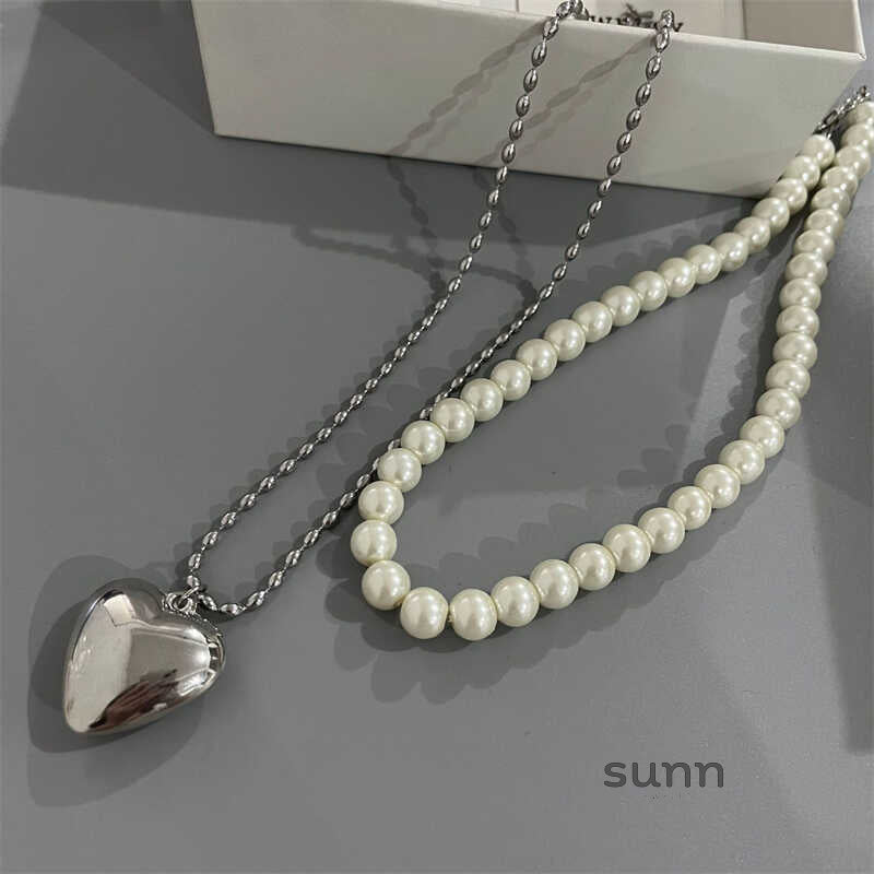 Malaika Pearl Heart Necklace Set [LCOOTCOL]