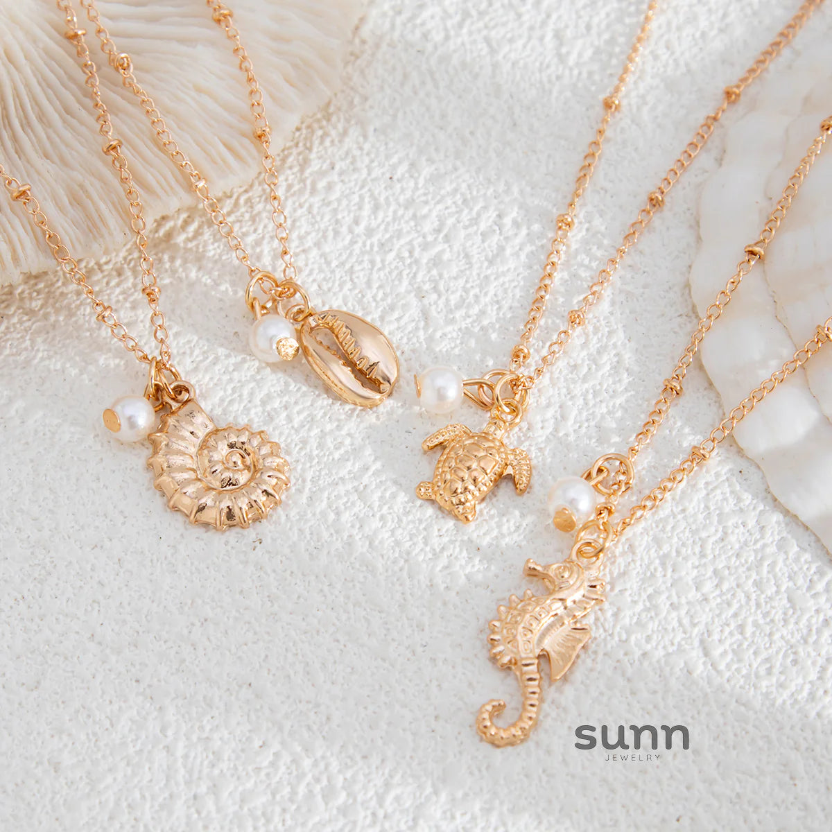 Malana Layered Pearl Charm Necklace Set