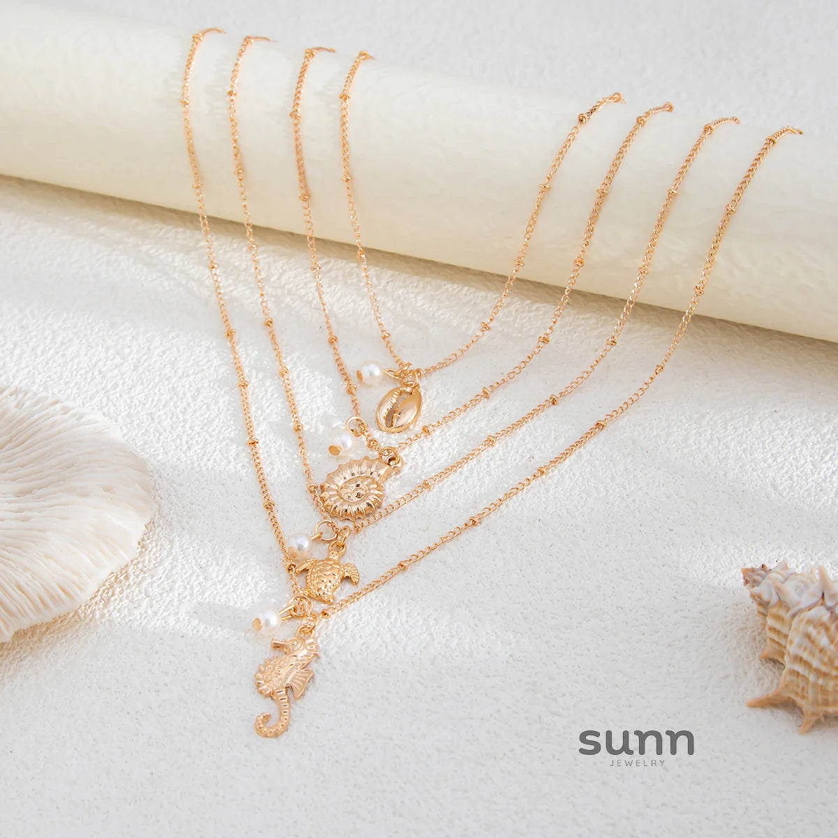 Malana Layered Pearl Charm Necklace Set