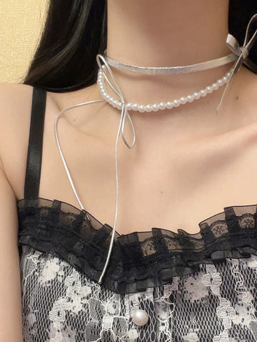 Marah Pearl Bow Necklace [M3ADC9SI]