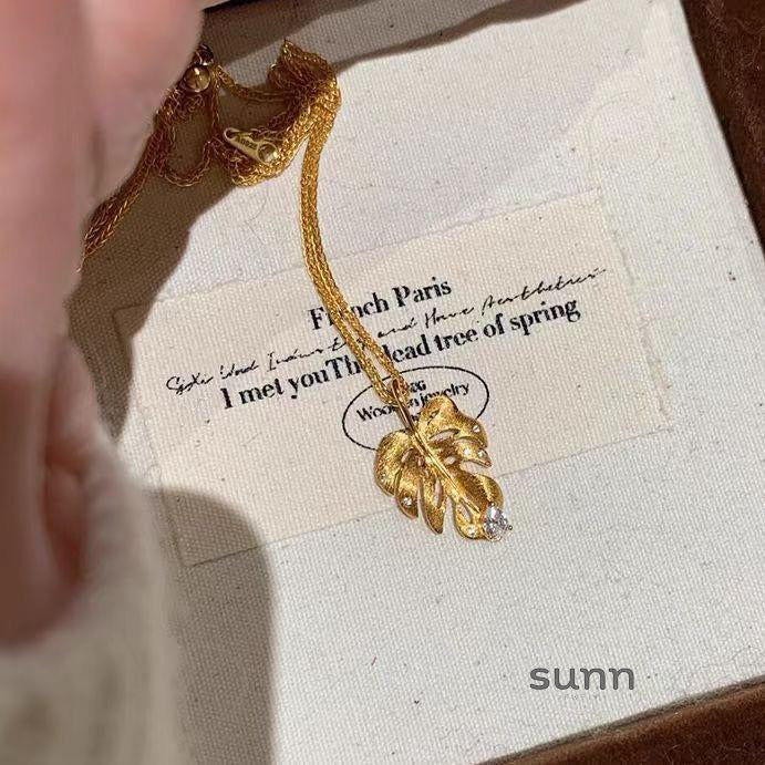Mirielle Sculpted Gold Leaf Necklace
