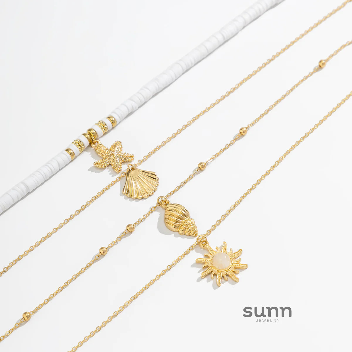 Nailah Gold Starfish Layered Necklace Set
