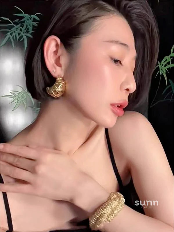 Nikita Sculptural Croissant Studs