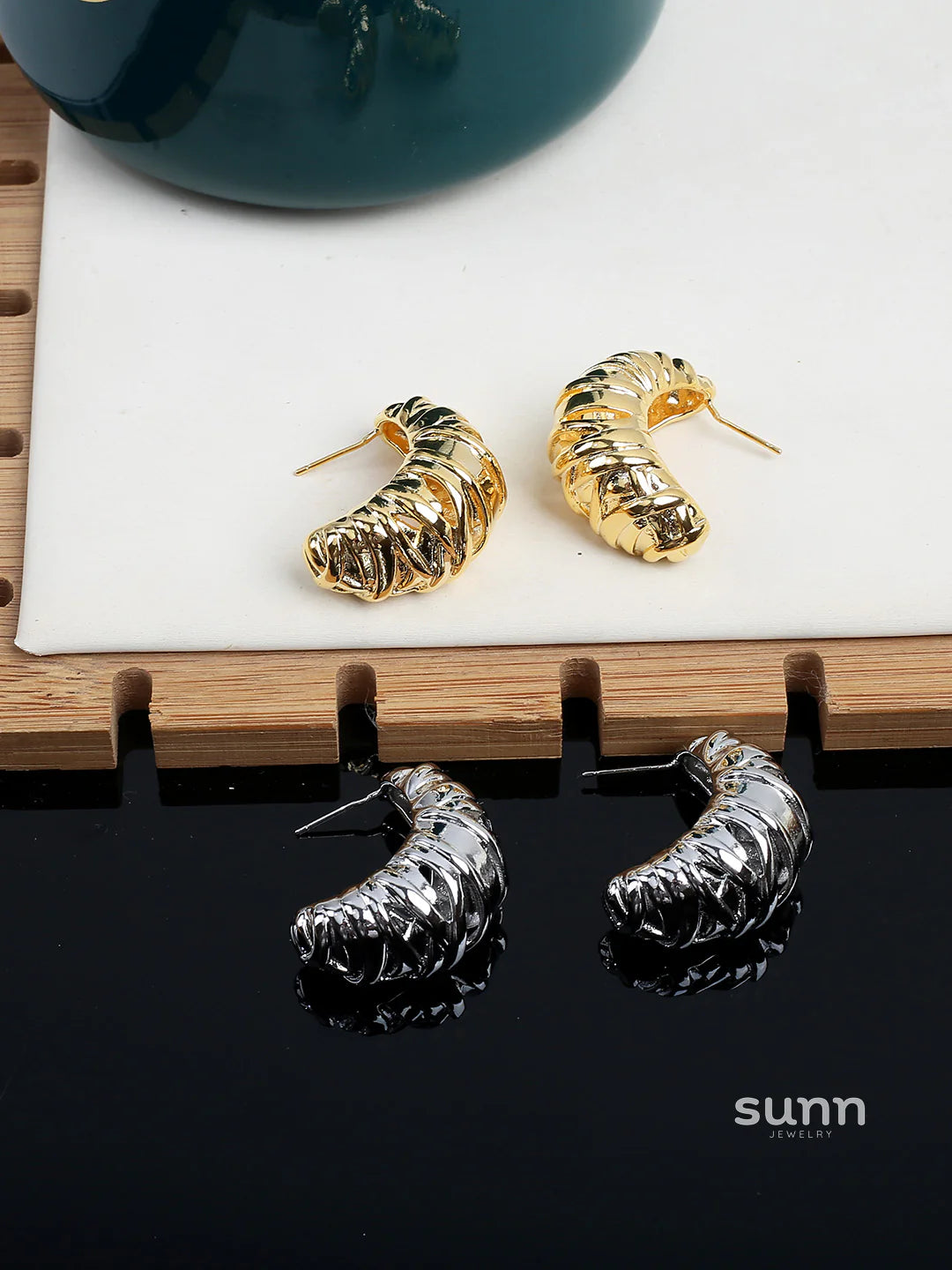 Nikita Sculptural Croissant Studs
