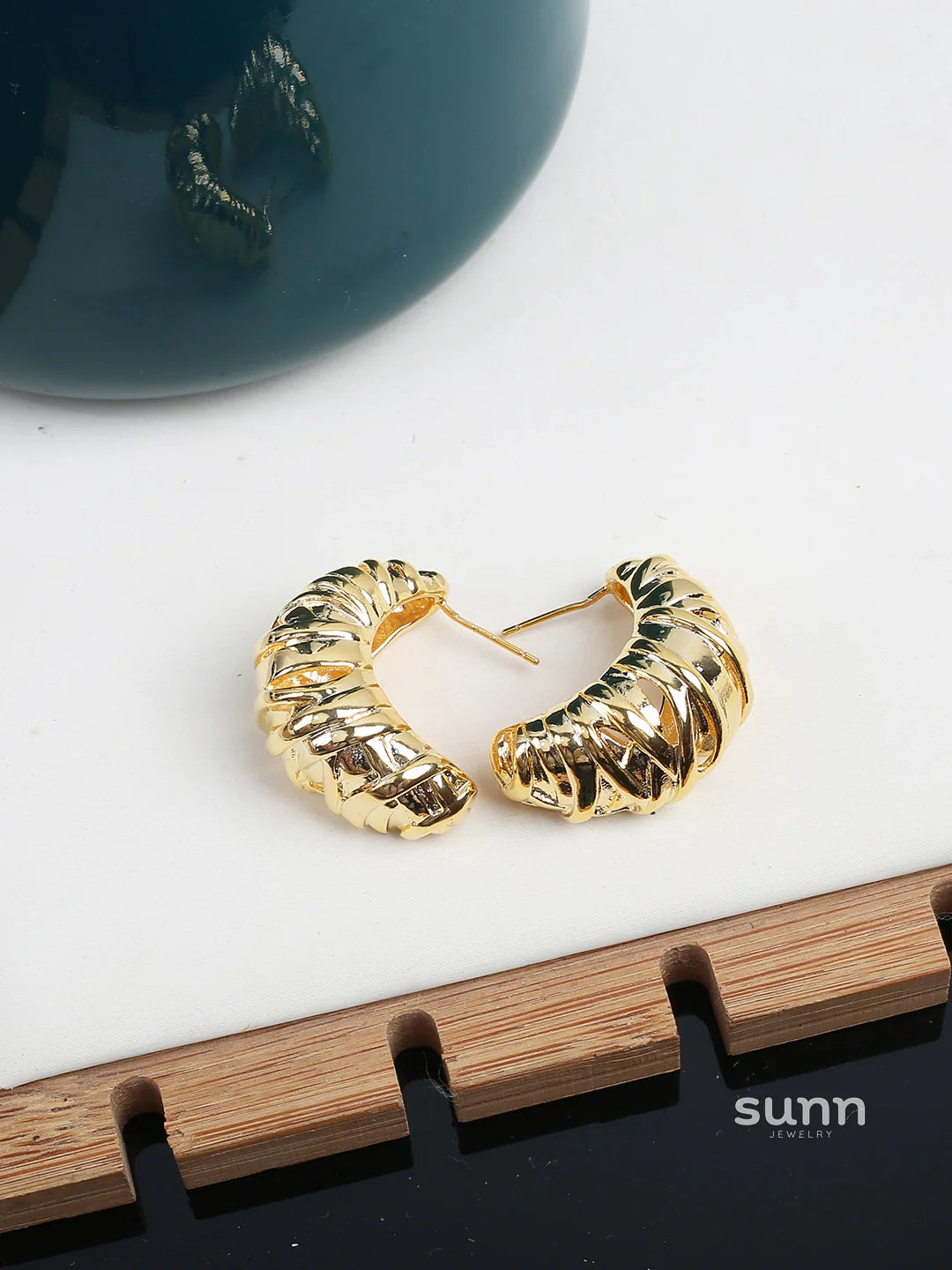 Nikita Sculptural Croissant Studs