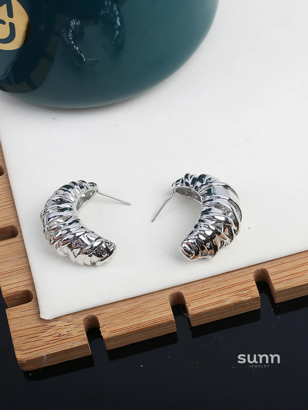 Nikita Sculptural Croissant Studs