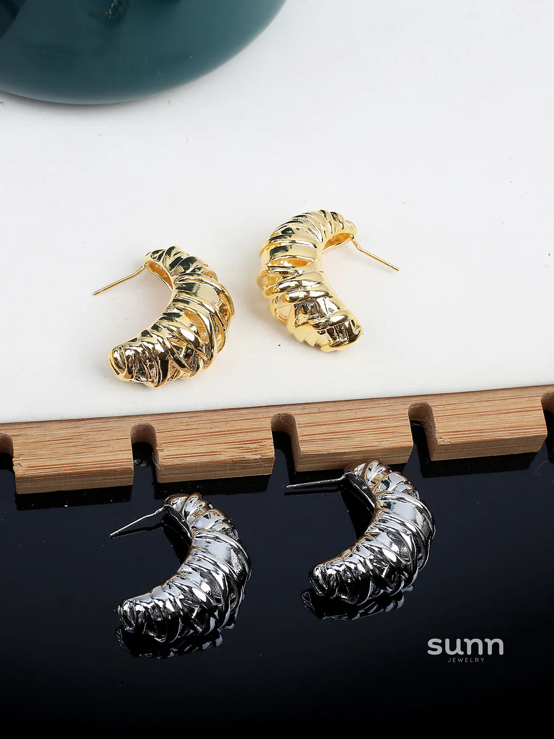 Nikita Sculptural Croissant Studs