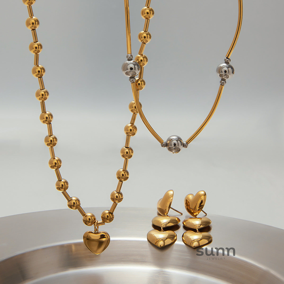 Nila Stainless Steel Heart Jewelry [HTQDS554]