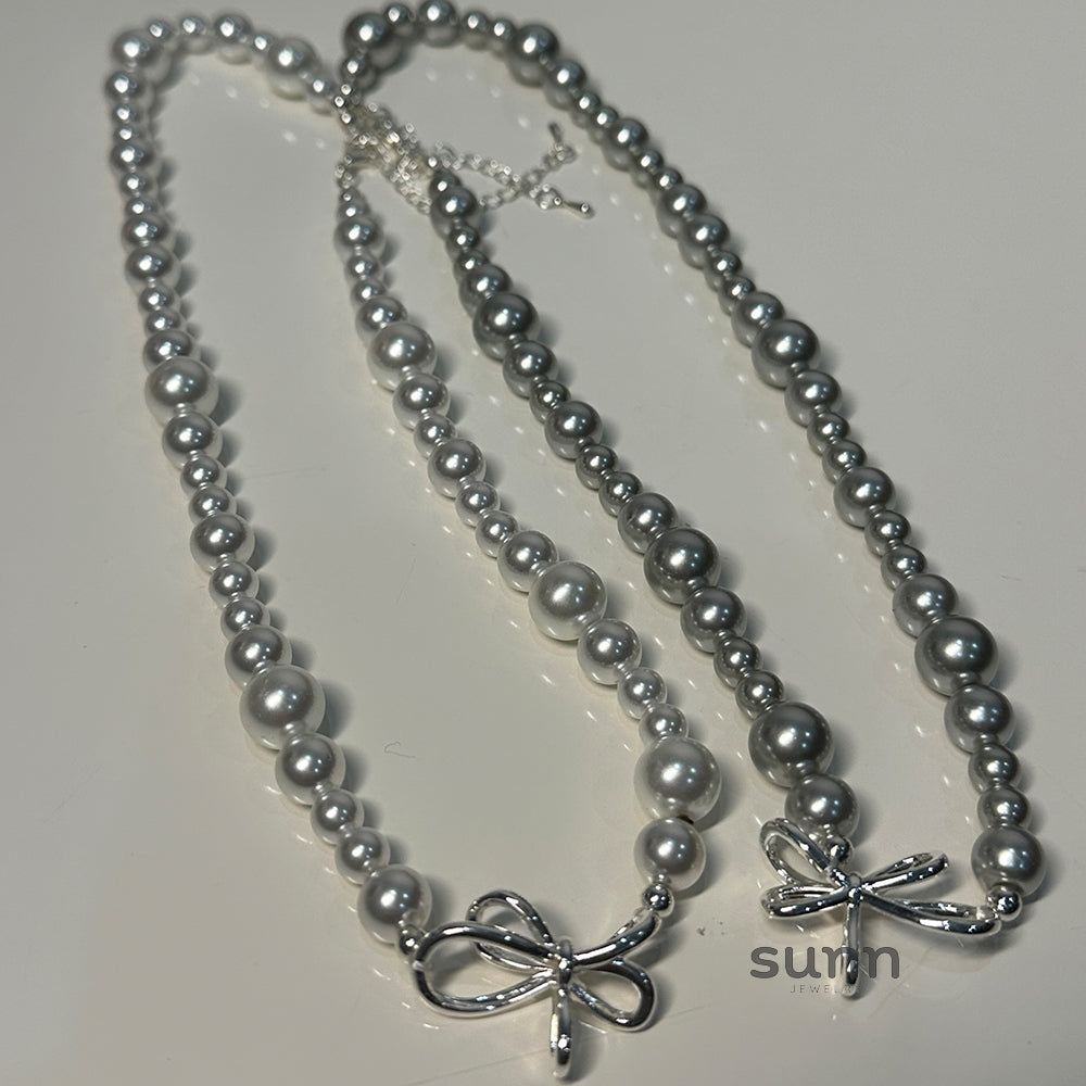Niyah Bow Pearl Necklace [SMABO8QD]