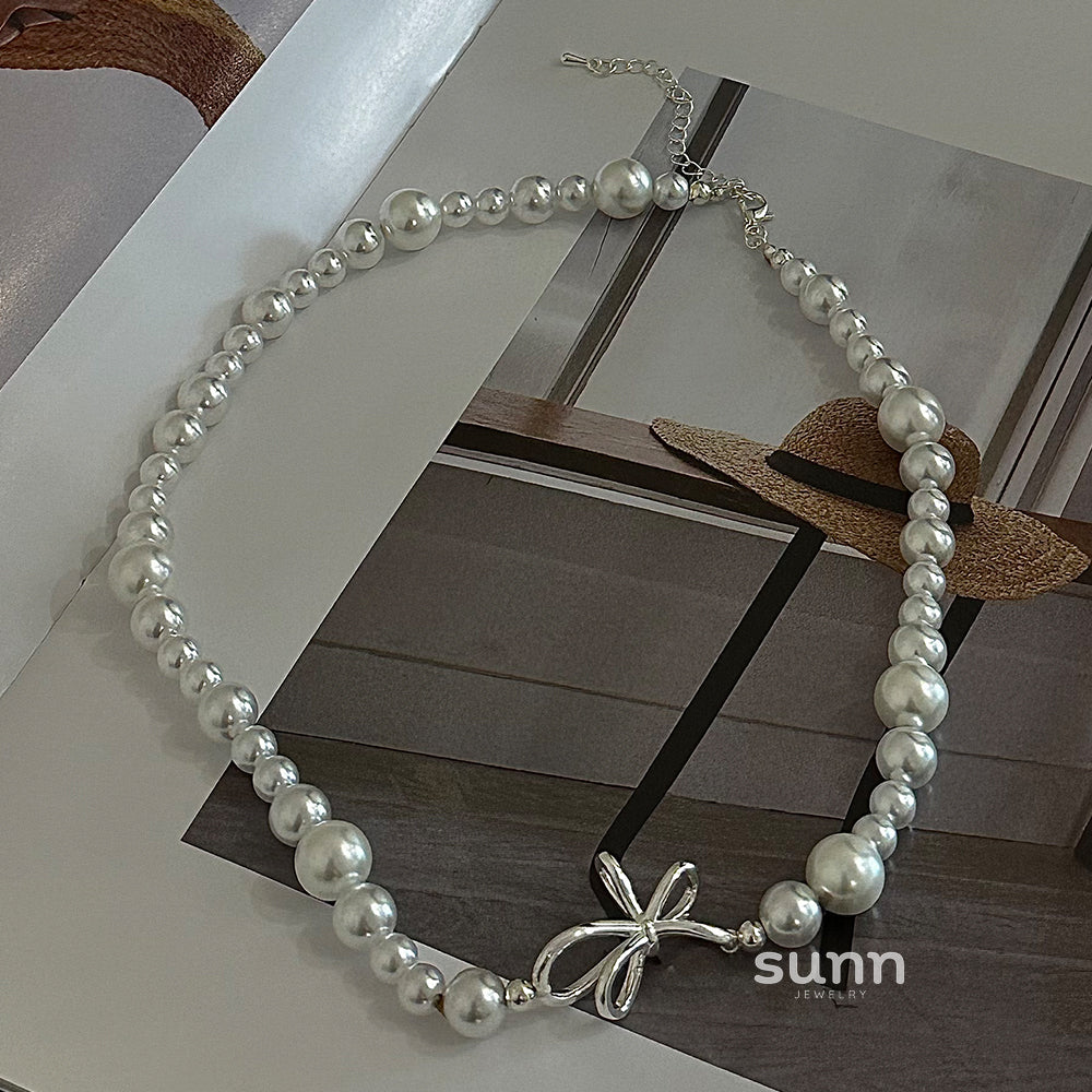 Niyah Bow Pearl Necklace [R8VT1Q3T]