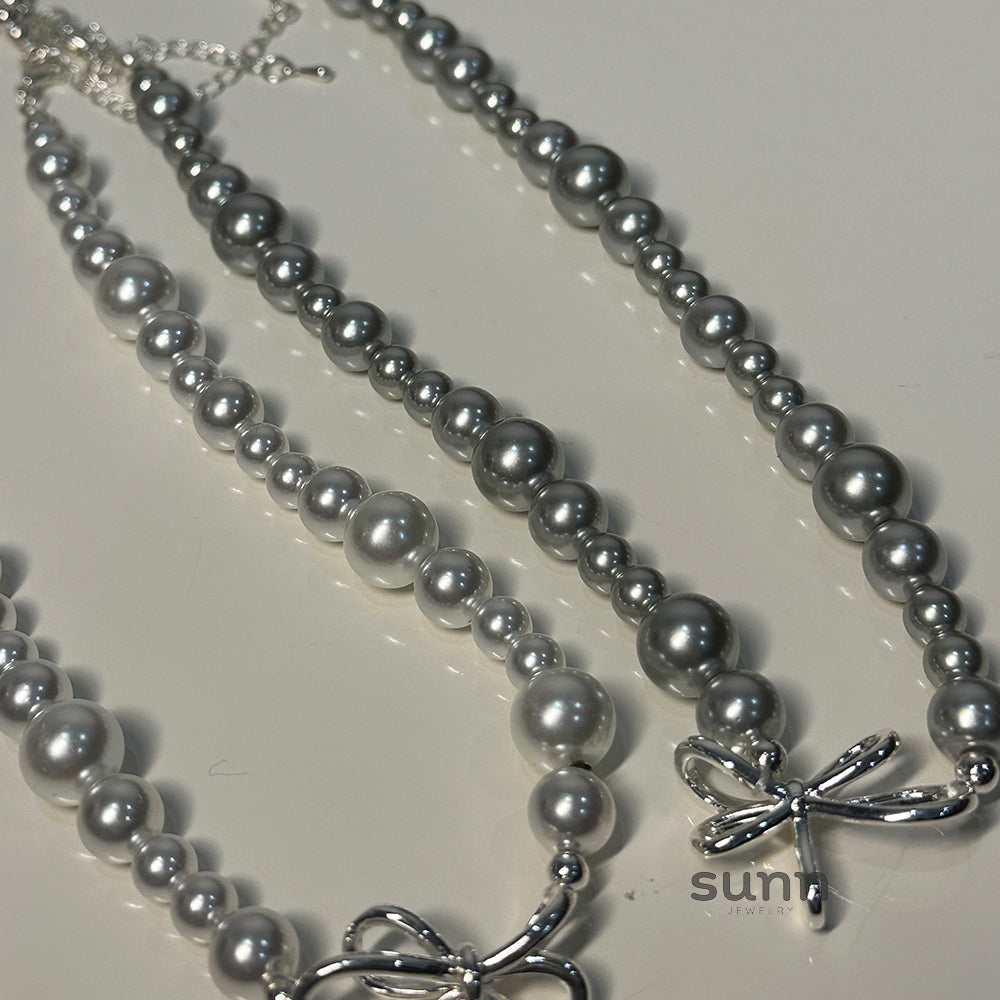 Niyah Bow Pearl Necklace [LS1FY9OH]
