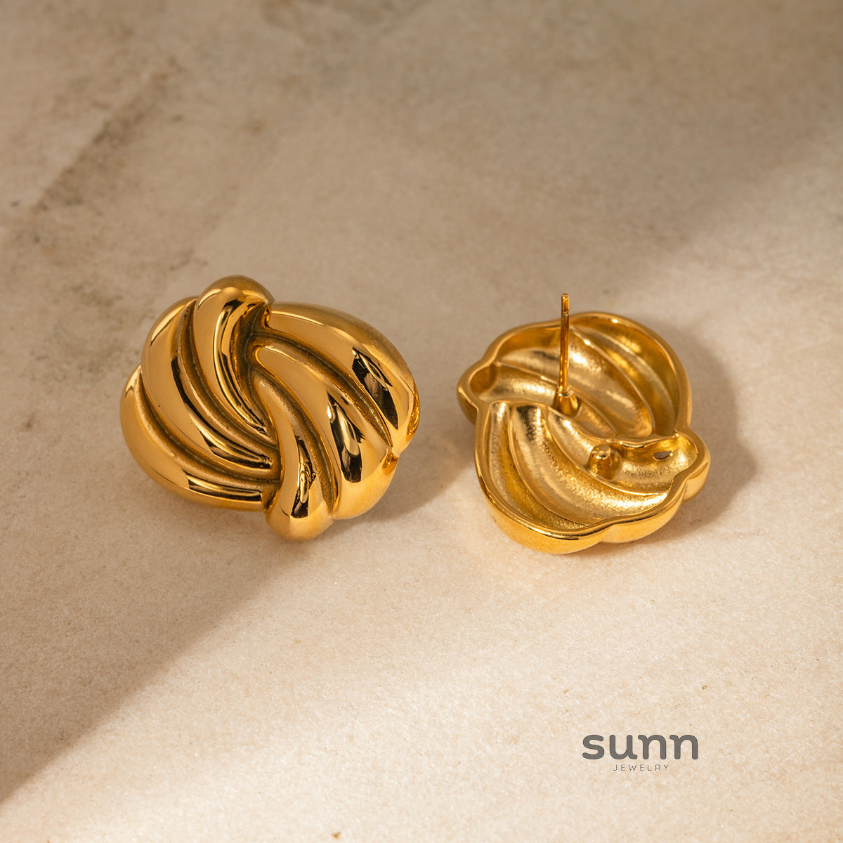 Niyah Gold Wave Stud Earrings