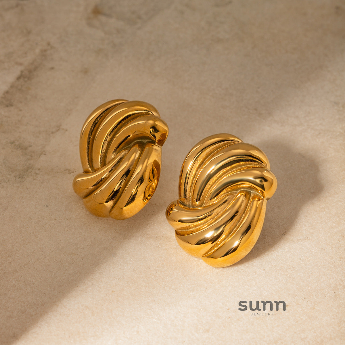 Niyah Gold Wave Stud Earrings