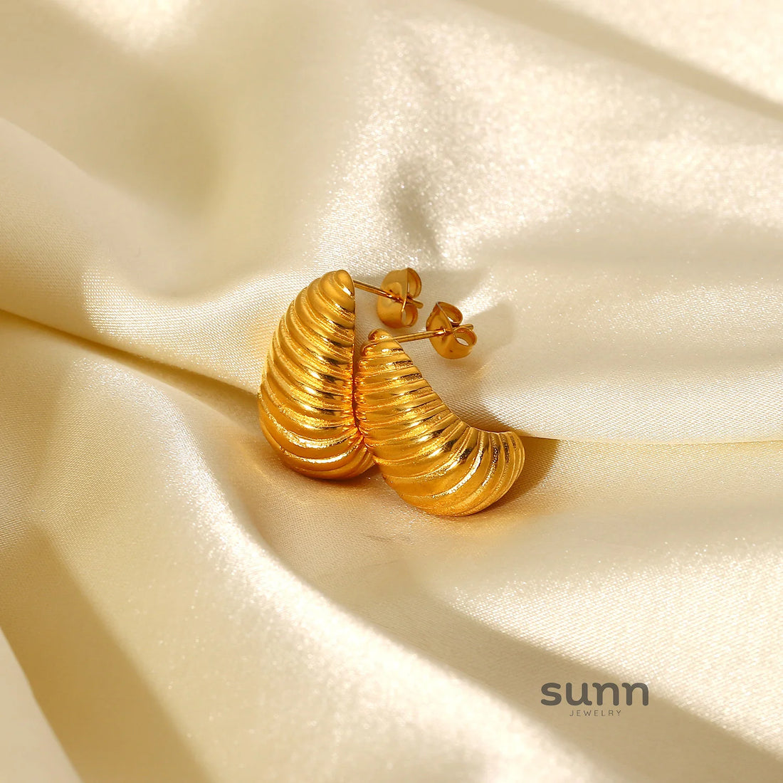 Nur Twisted Golden Stud Earrings