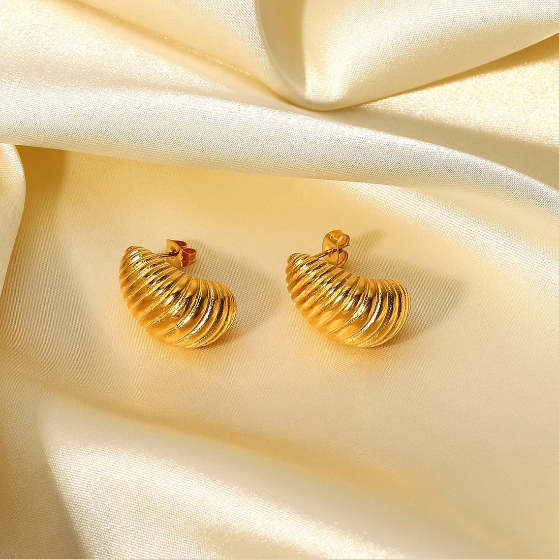 Nur Twisted Golden Stud Earrings