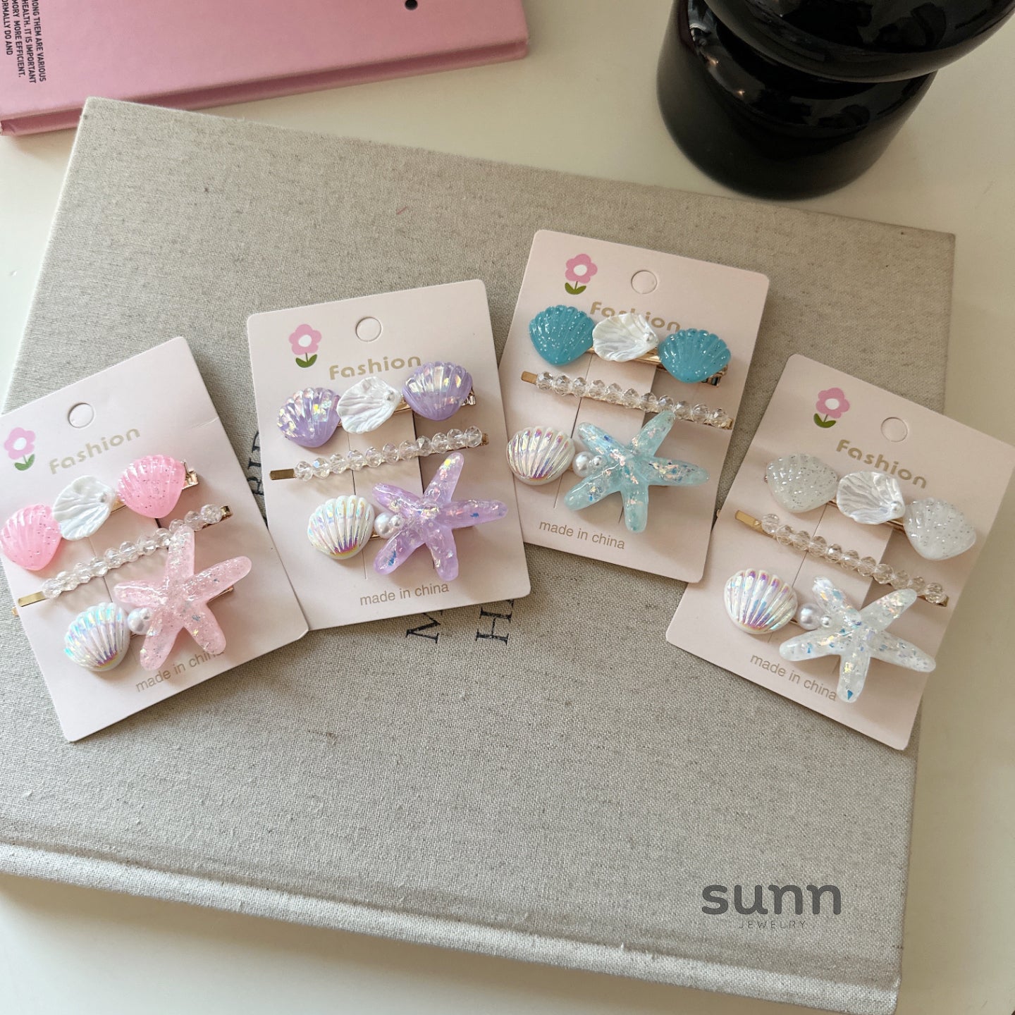 Oaklyn Iridescent Starfish Hair Clip [ICK2SMQA]