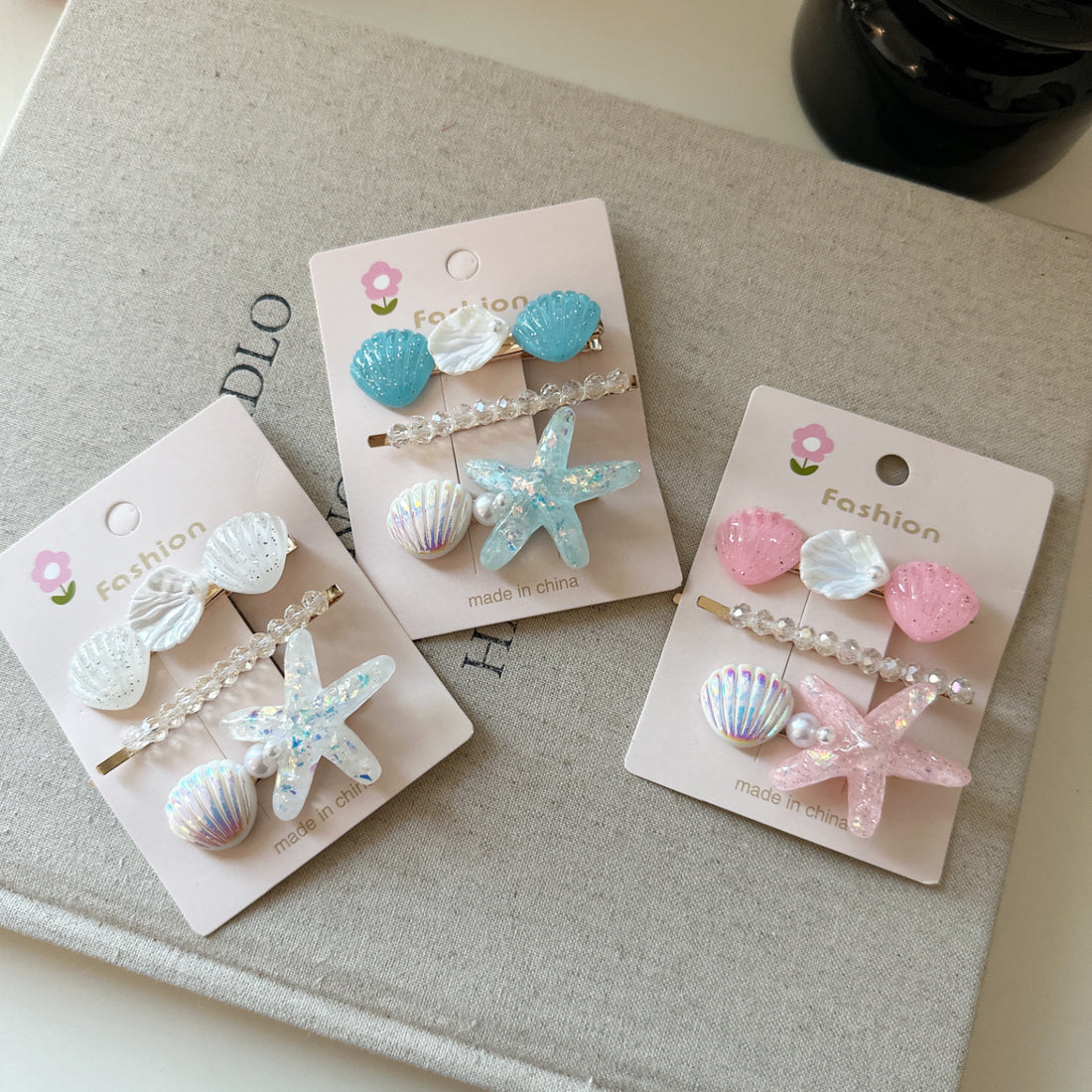 Oaklyn Iridescent Starfish Hair Clip [2VYZQE5S]