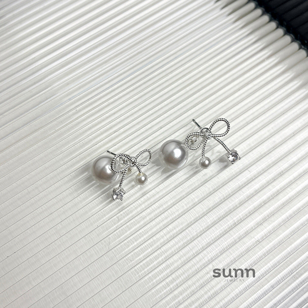 Rosalee Pearl Bow Earrings [WLGI6BT0]