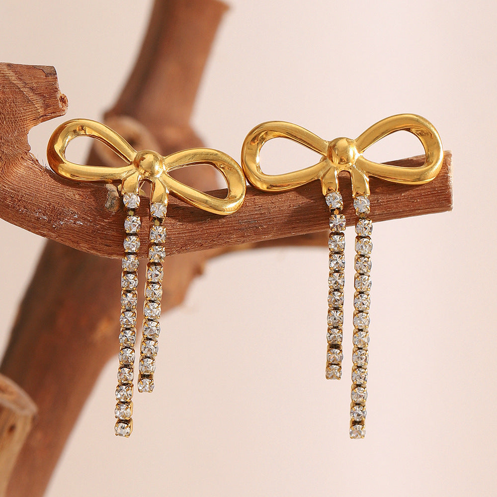 Sarayu Bow Zircon Tassel Earrings [95W7Z2NF]