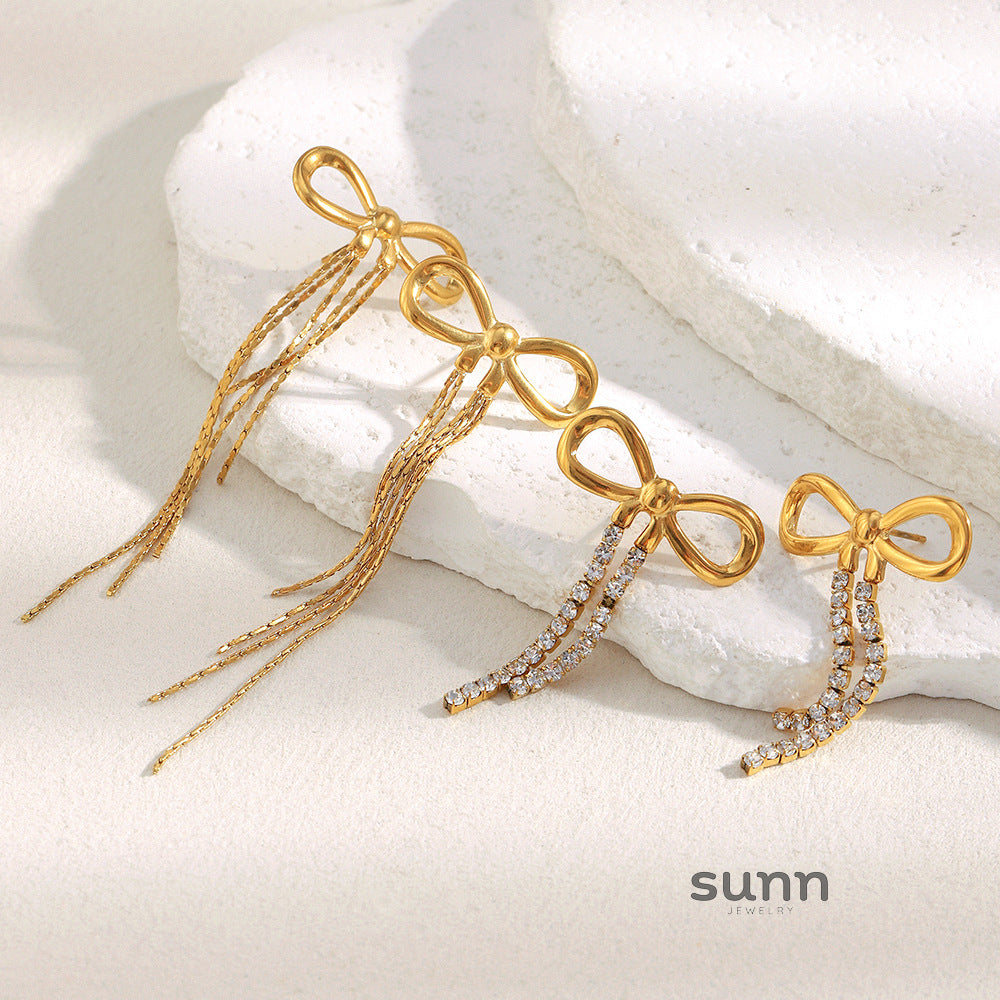 Sarayu Bow Zircon Tassel Earrings [YVF5CYN5]