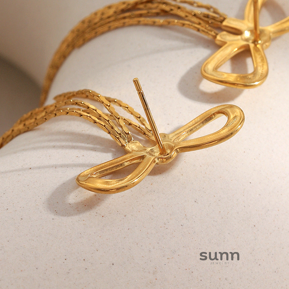 Sarayu Bow Zircon Tassel Earrings [BF840365]