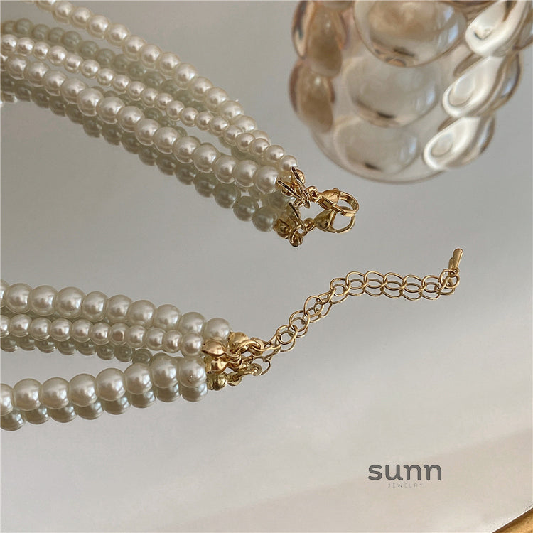 Skylie Triple Strand Pearl Necklace [GQP5F6G9]