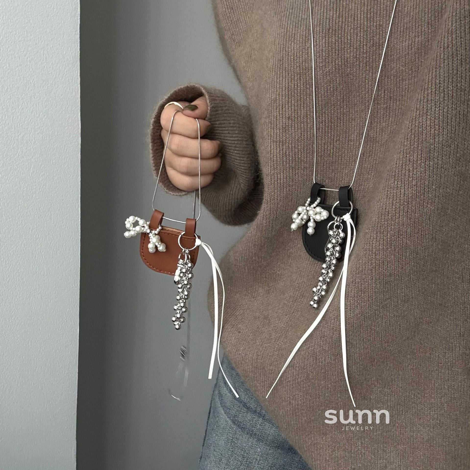 Syriah Pearl Bow Leather Necklace [GPCN9HYM]