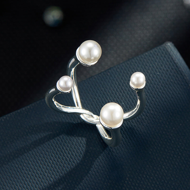 Taelor Dainty Pearl Cross Ring [NDX0OBOX]