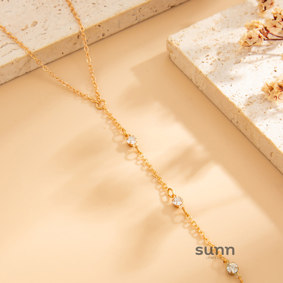 Tahiry Layered Rhinestone Hand Chain [LHPMHYY9]