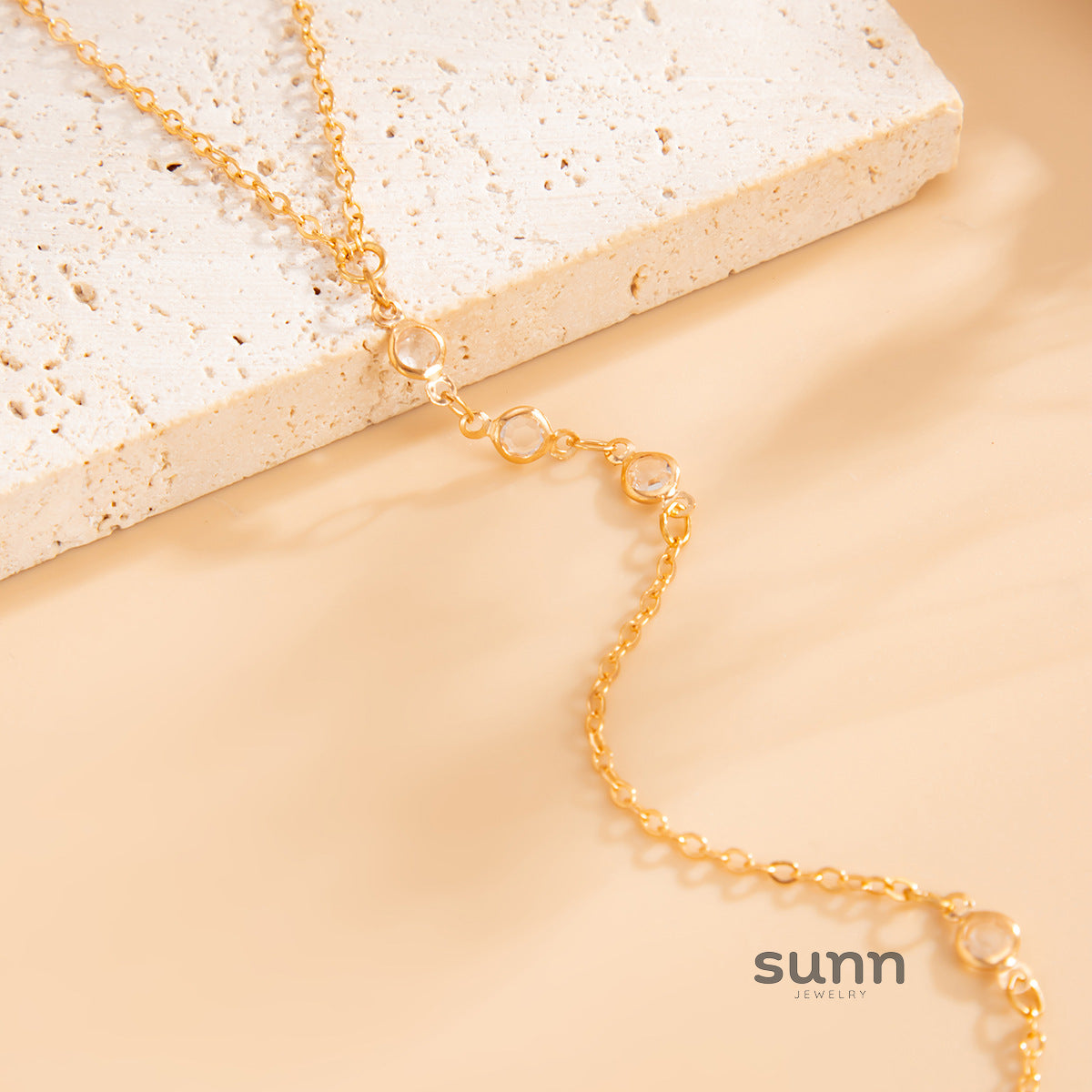 Tahiry Layered Rhinestone Hand Chain [U1SMT22N]