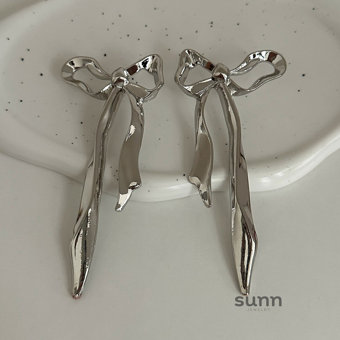 Tyra Sculptural Bow Petal Earrings [W1R2Q18S]