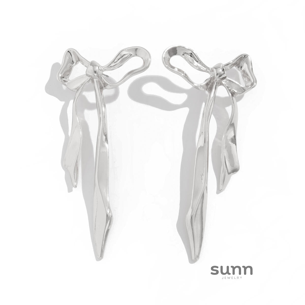 Tyra Sculptural Bow Petal Earrings [52D1JR9L]