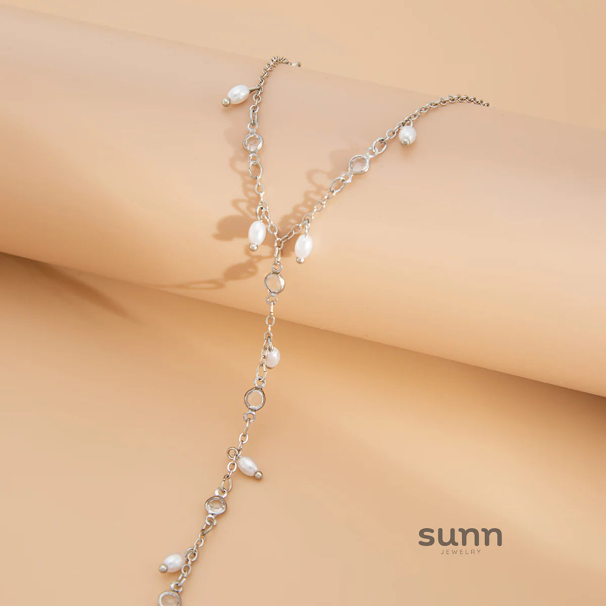 Yuna Pearl Tassel Hand Chain