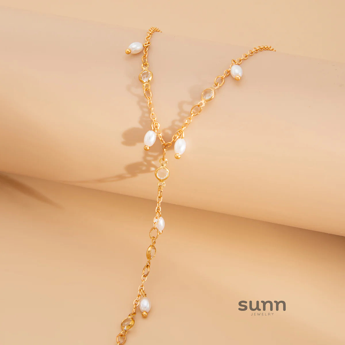 Yuna Pearl Tassel Hand Chain