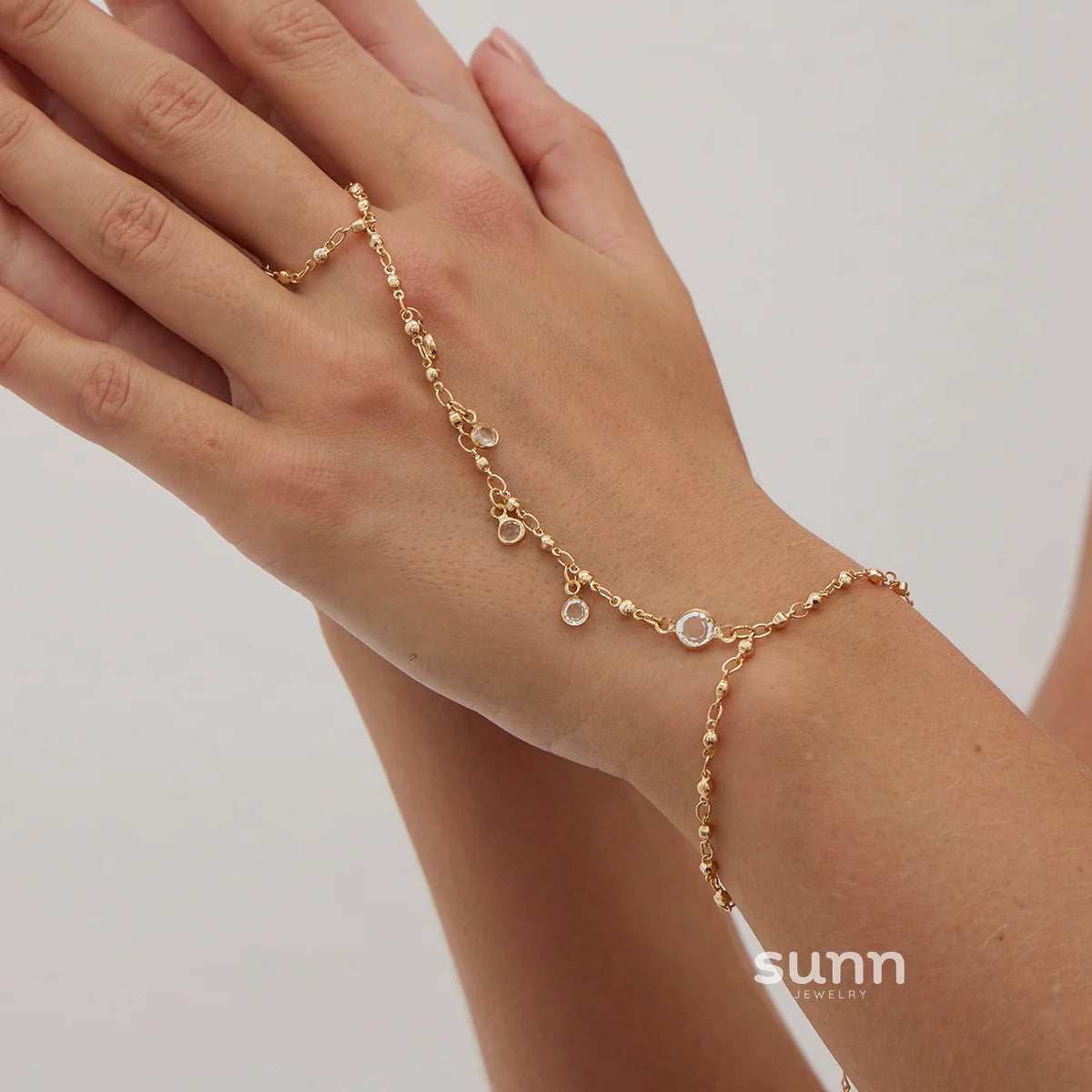 Yuna Pearl Tassel Hand Chain