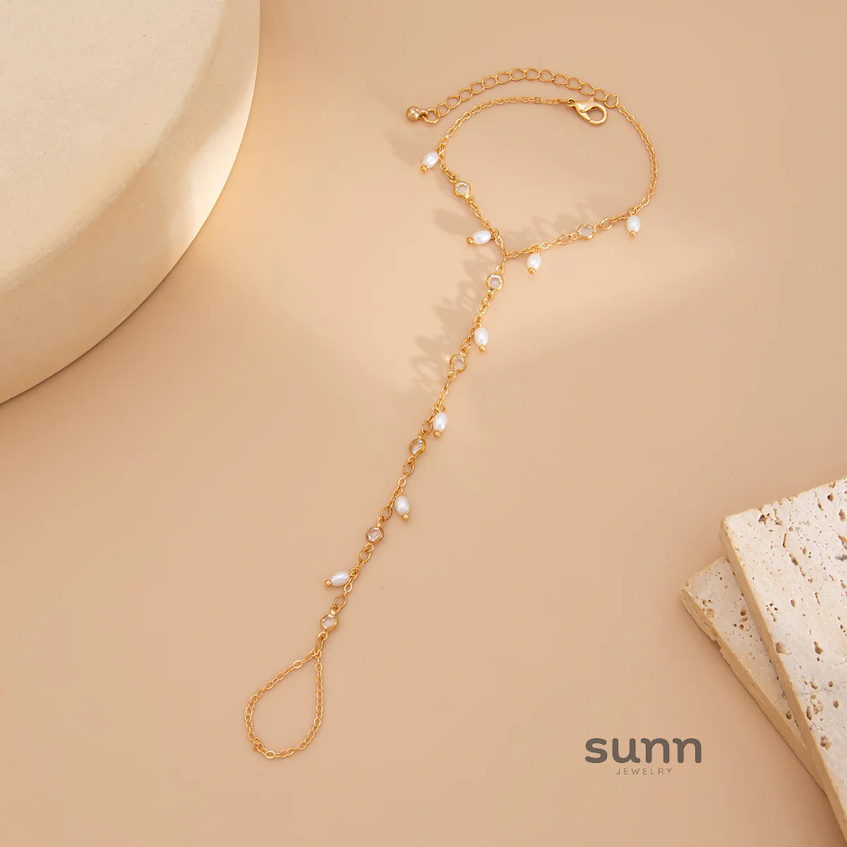 Yuna Pearl Tassel Hand Chain