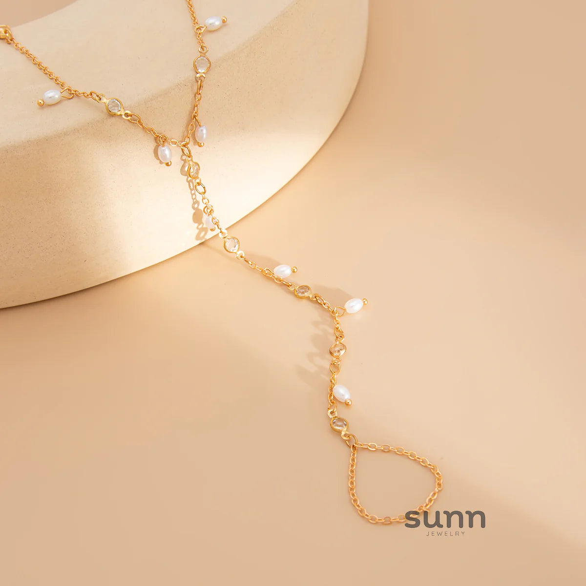 Yuna Pearl Tassel Hand Chain