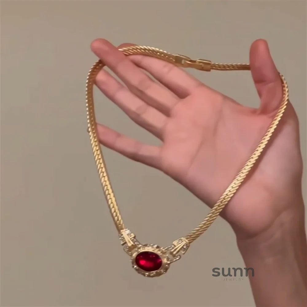 Yurani Gold Oval Pendant Necklace